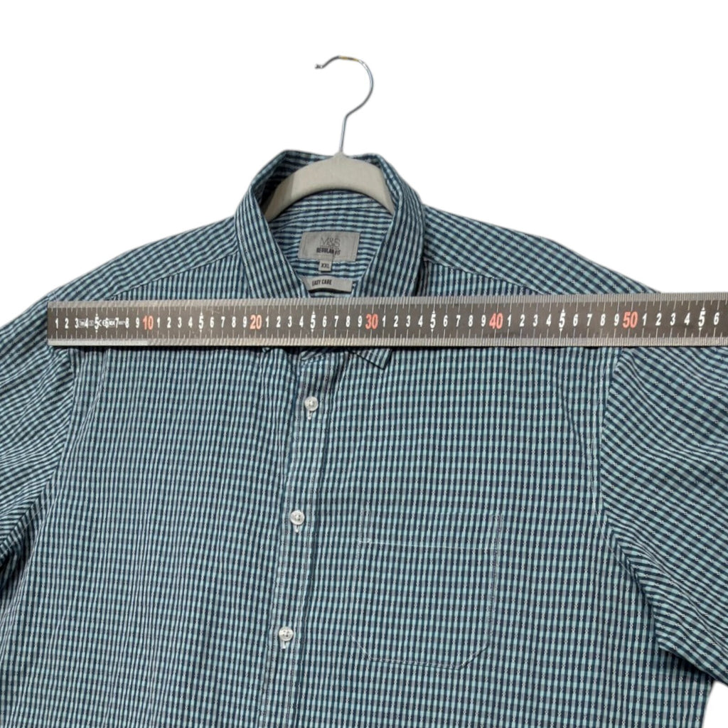 Marks & Spencer blue short sleeve shirt with pocket and subtle patterned design.