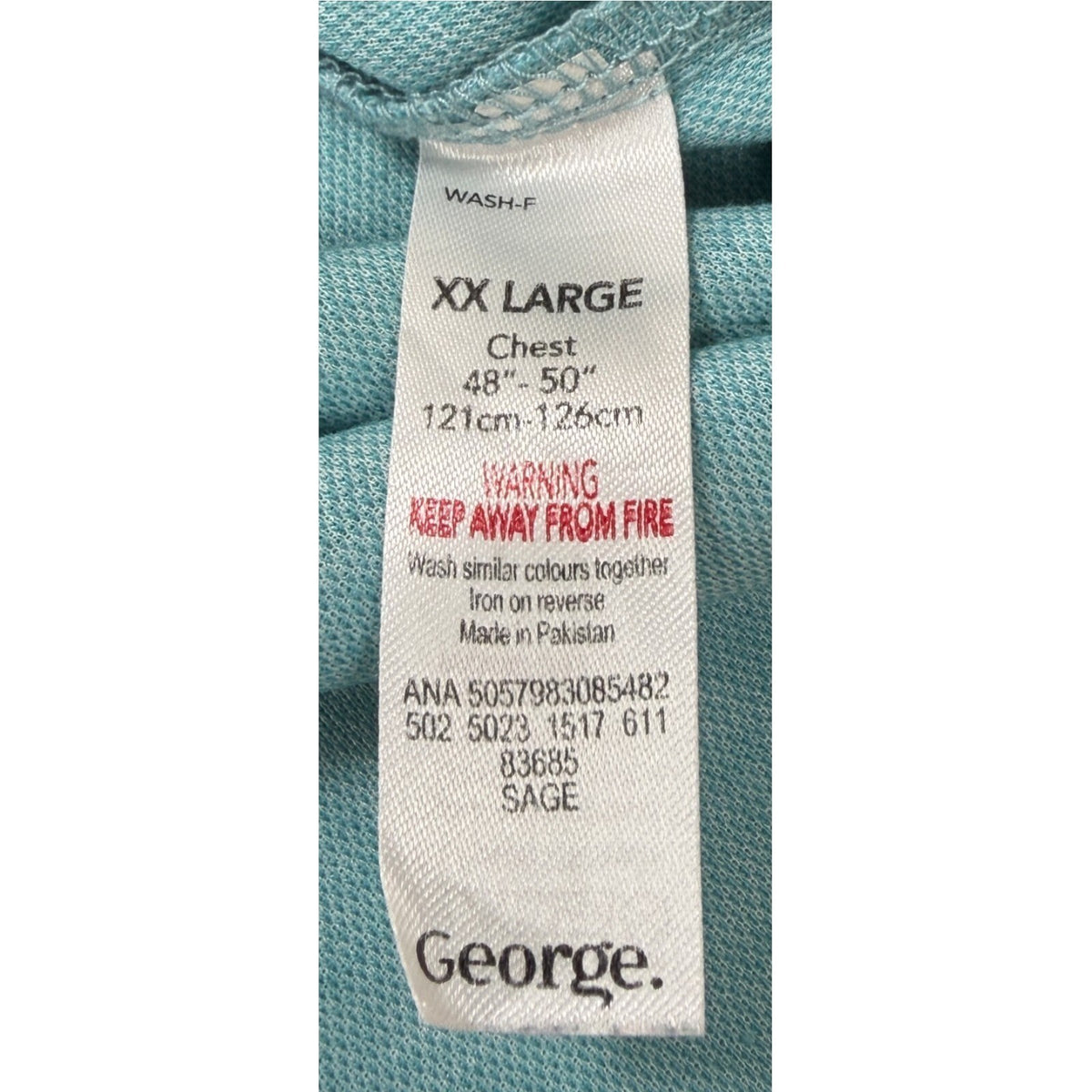 George green polo shirt with pocket, button-down, nature-inspired pattern.