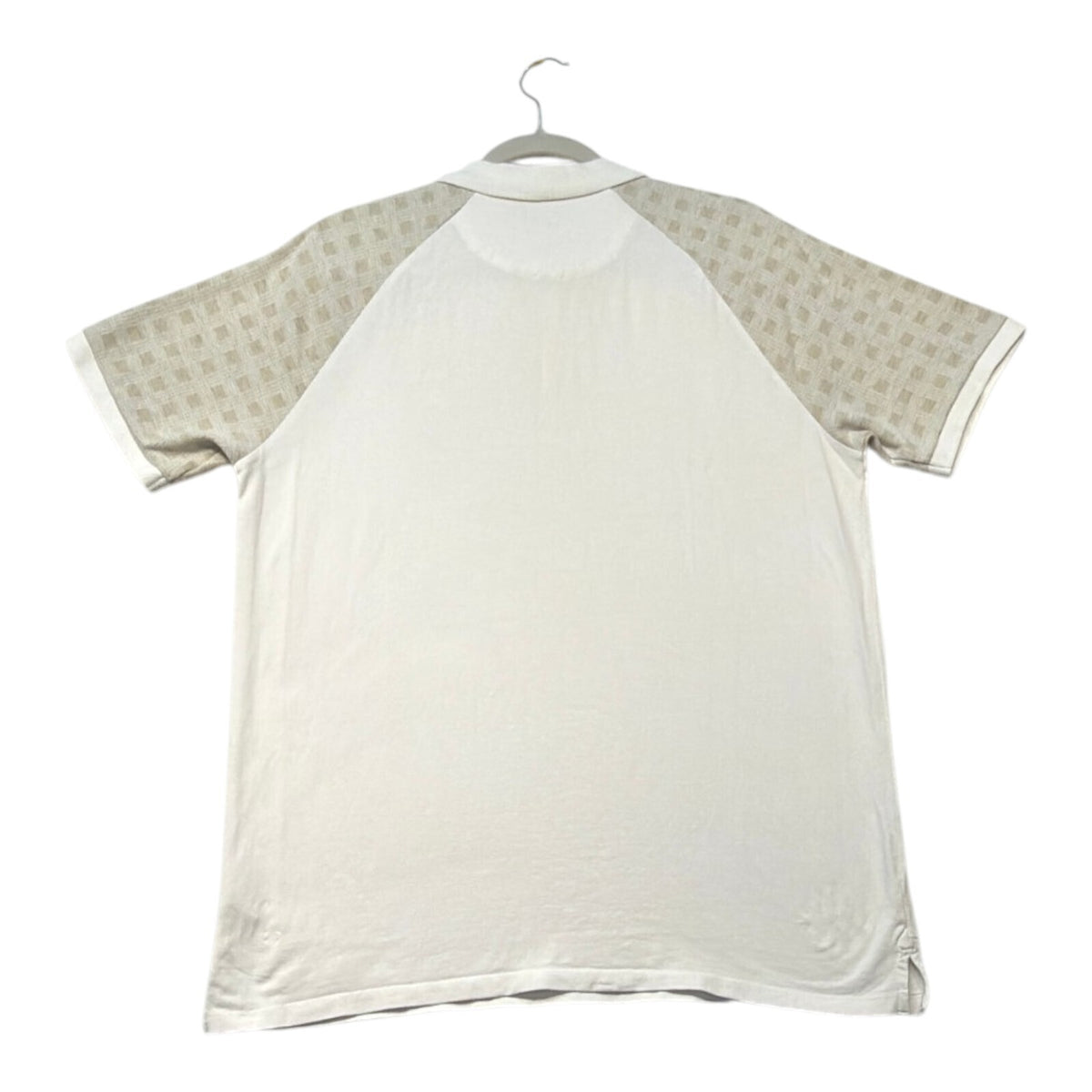 Primark beige zip polo shirt with wing collar and contrasting patterned panels.