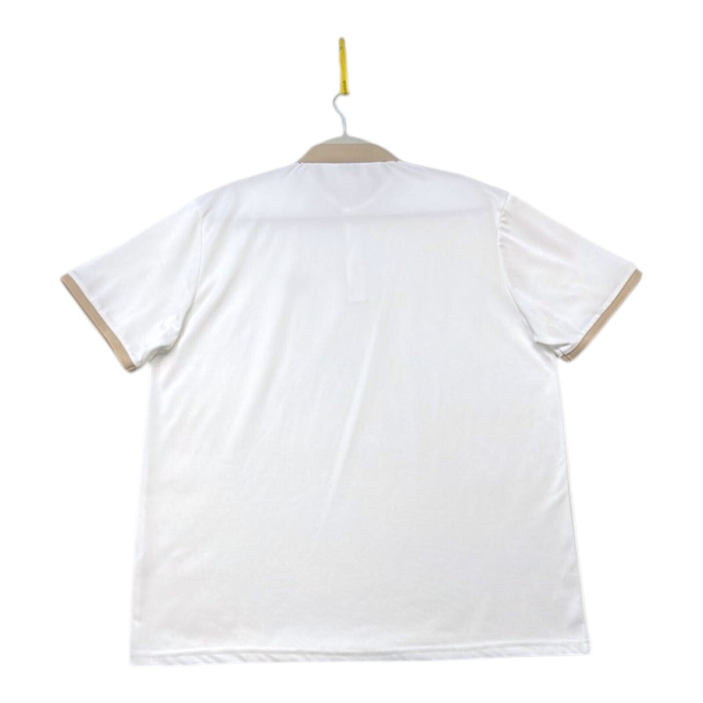 Laurel Wreath white polo shirt with graphic print and structured neckline.
