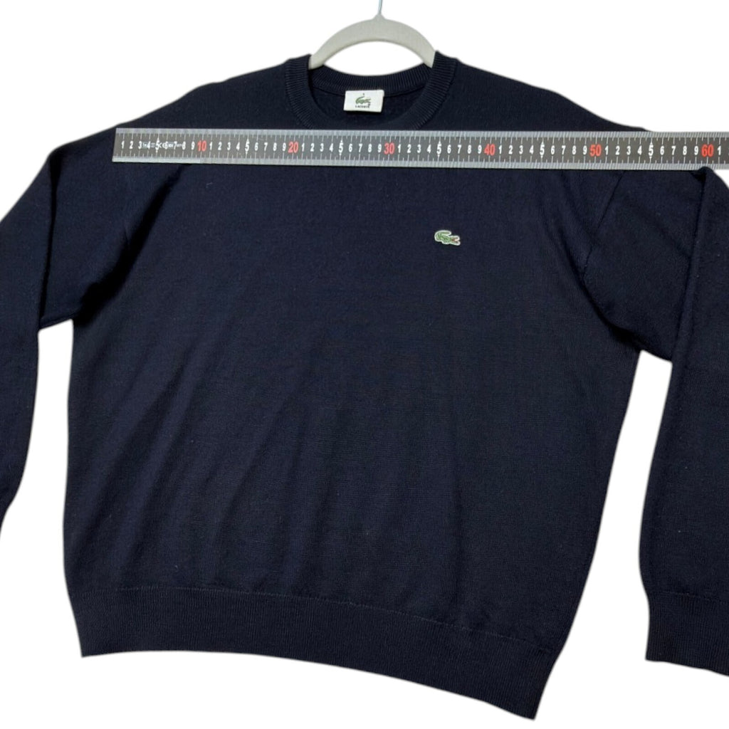 Lacoste blue crewneck sweater long sleeve with embroidered logo and ribbed cuffs.
