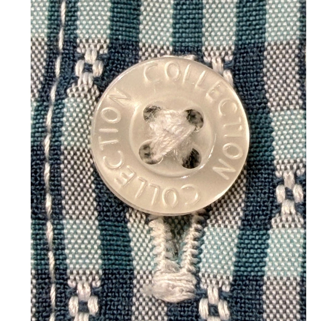 Marks & Spencer blue short sleeve shirt with pocket and subtle patterned design.