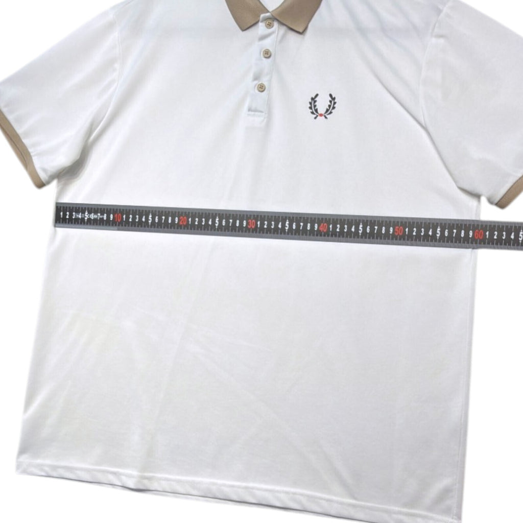 Laurel Wreath white polo shirt with graphic print and structured neckline.