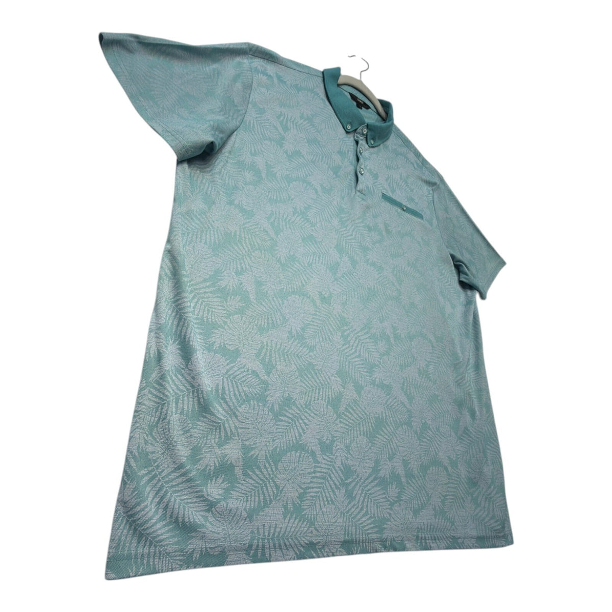George green polo shirt with pocket, button-down, nature-inspired pattern.