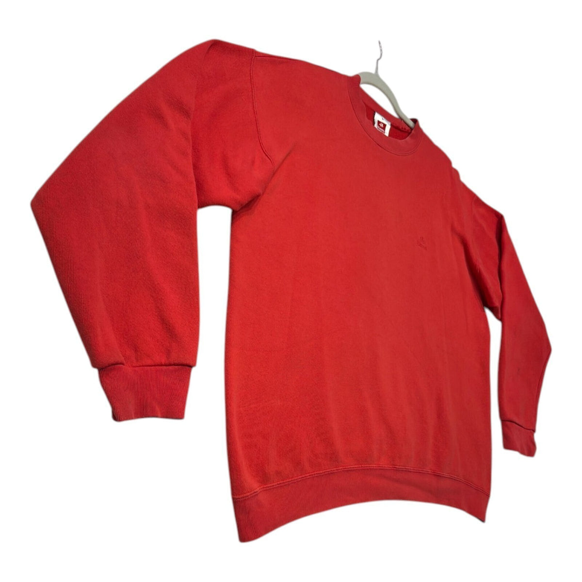 Hanes red crewneck jumper with long sleeves and elasticated cuffs.