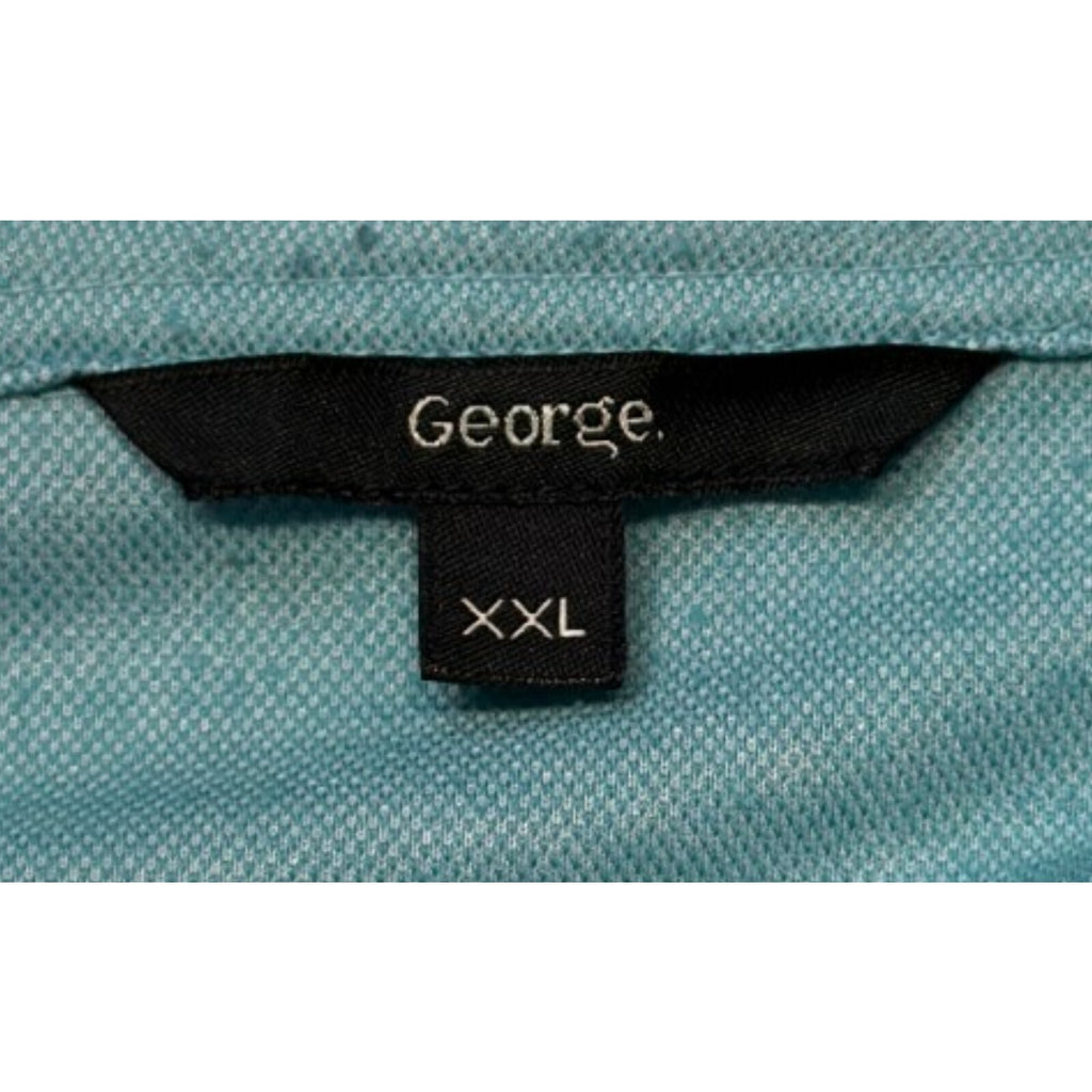 George green polo shirt with pocket, button-down, nature-inspired pattern.