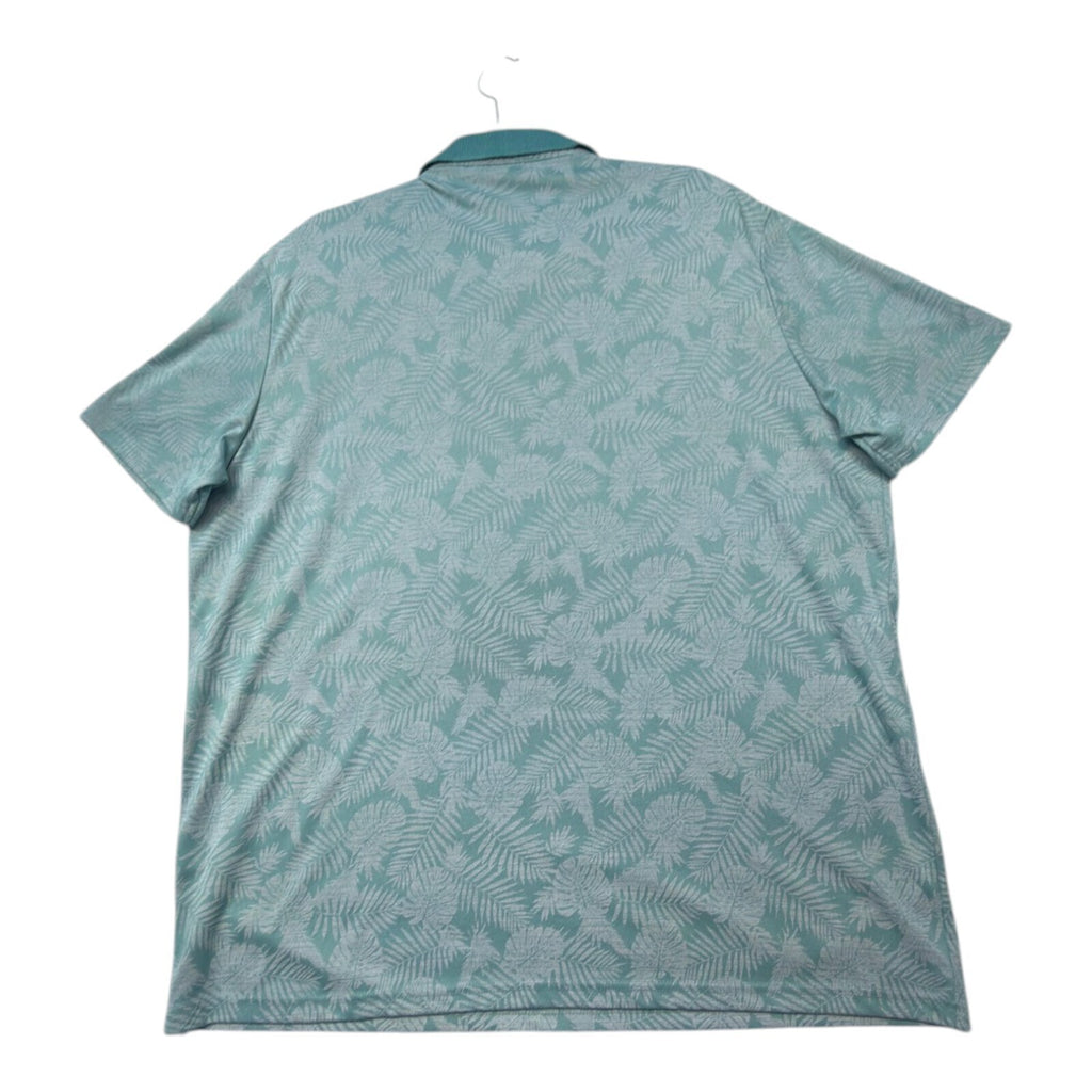 George green polo shirt with pocket, button-down, nature-inspired pattern.