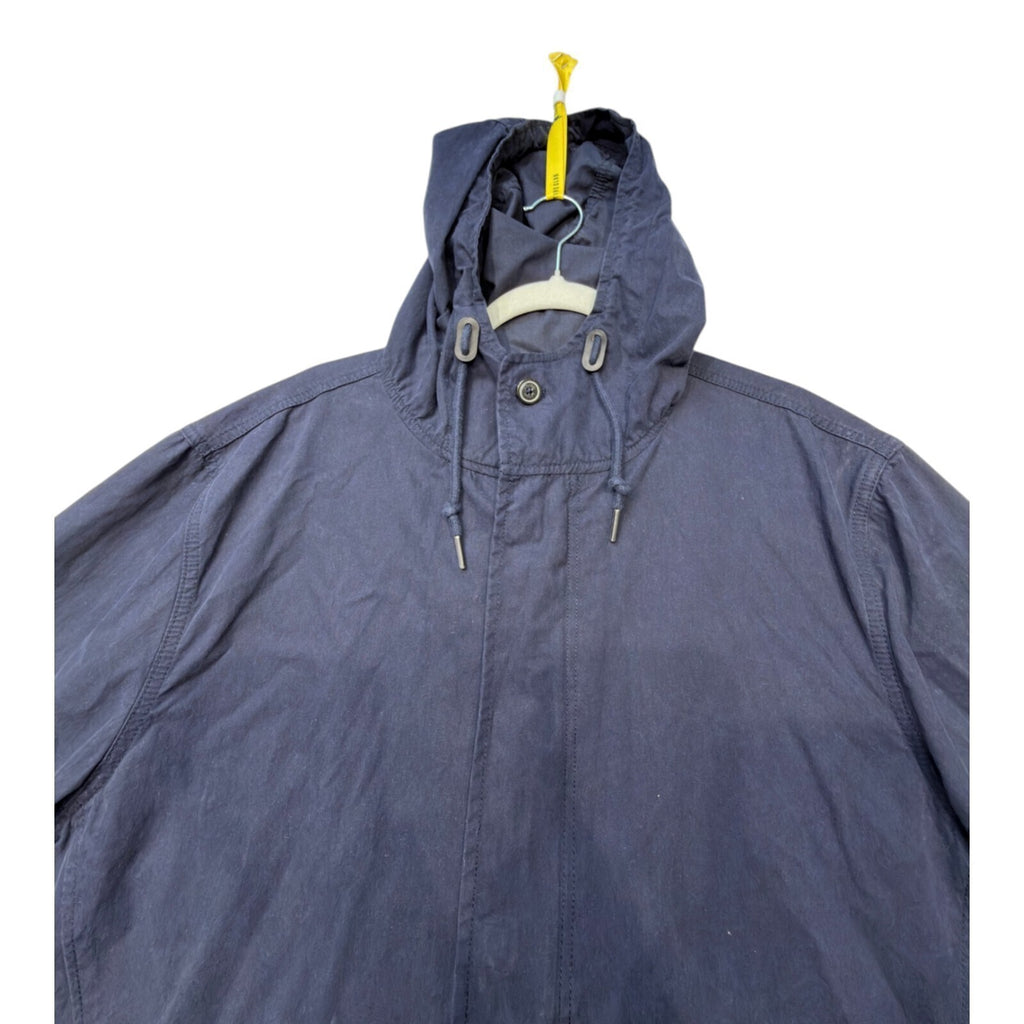 Admiral blue rain coat with drawstring waist, hood, and logo detail.