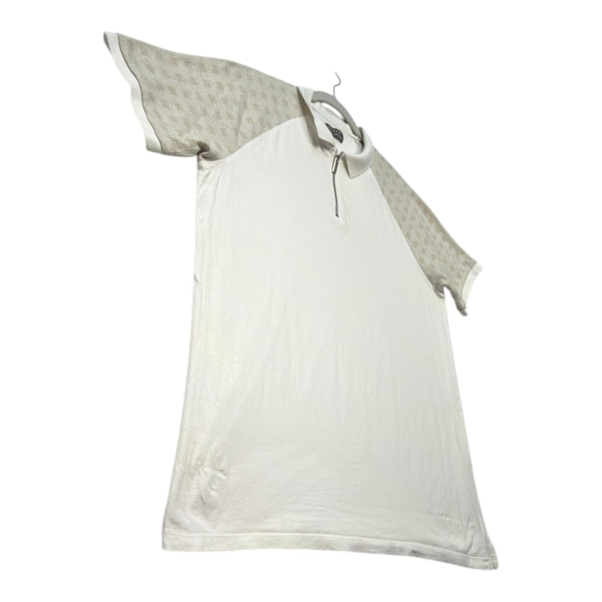 Primark beige zip polo shirt with wing collar and contrasting patterned panels.