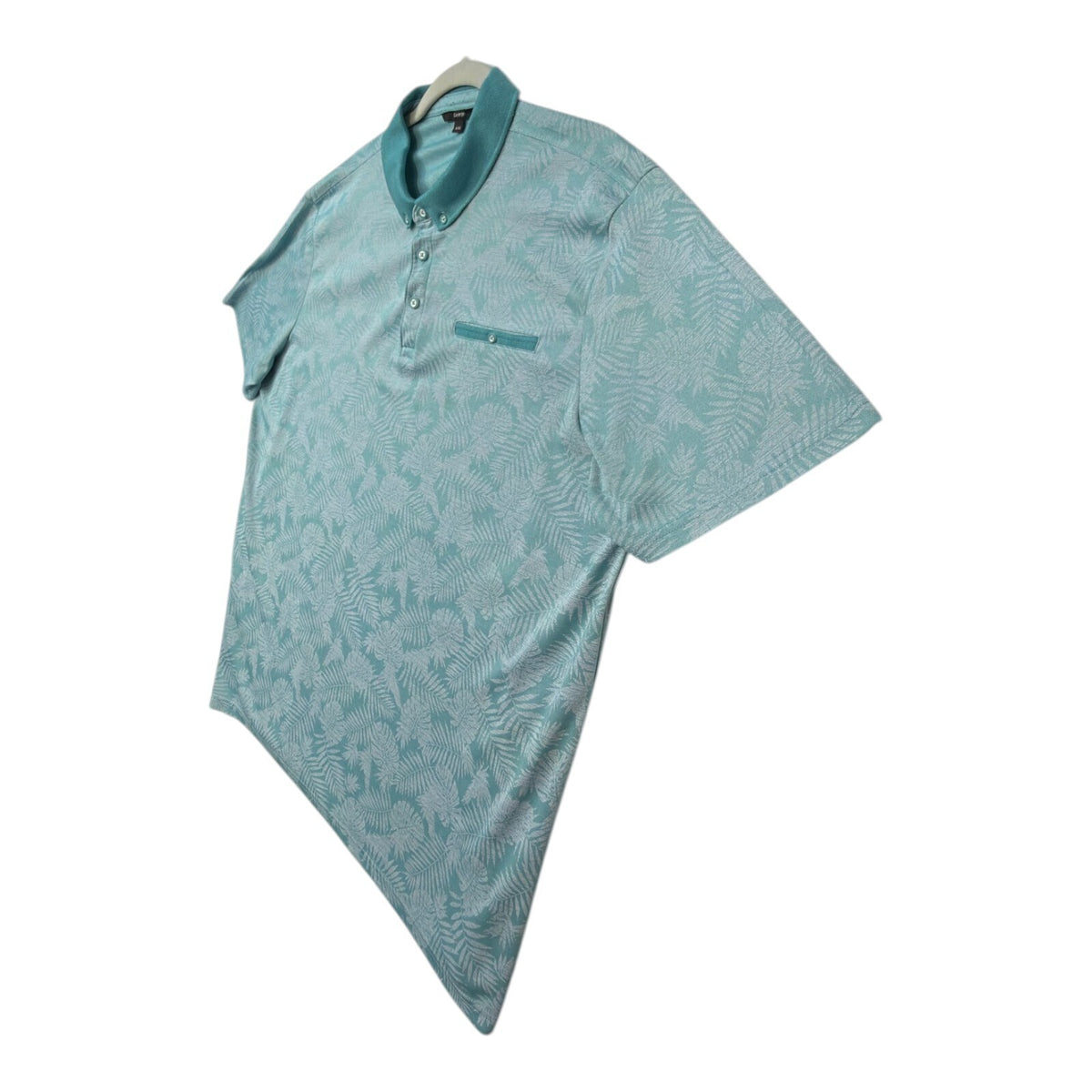 George green polo shirt with pocket, button-down, nature-inspired pattern.