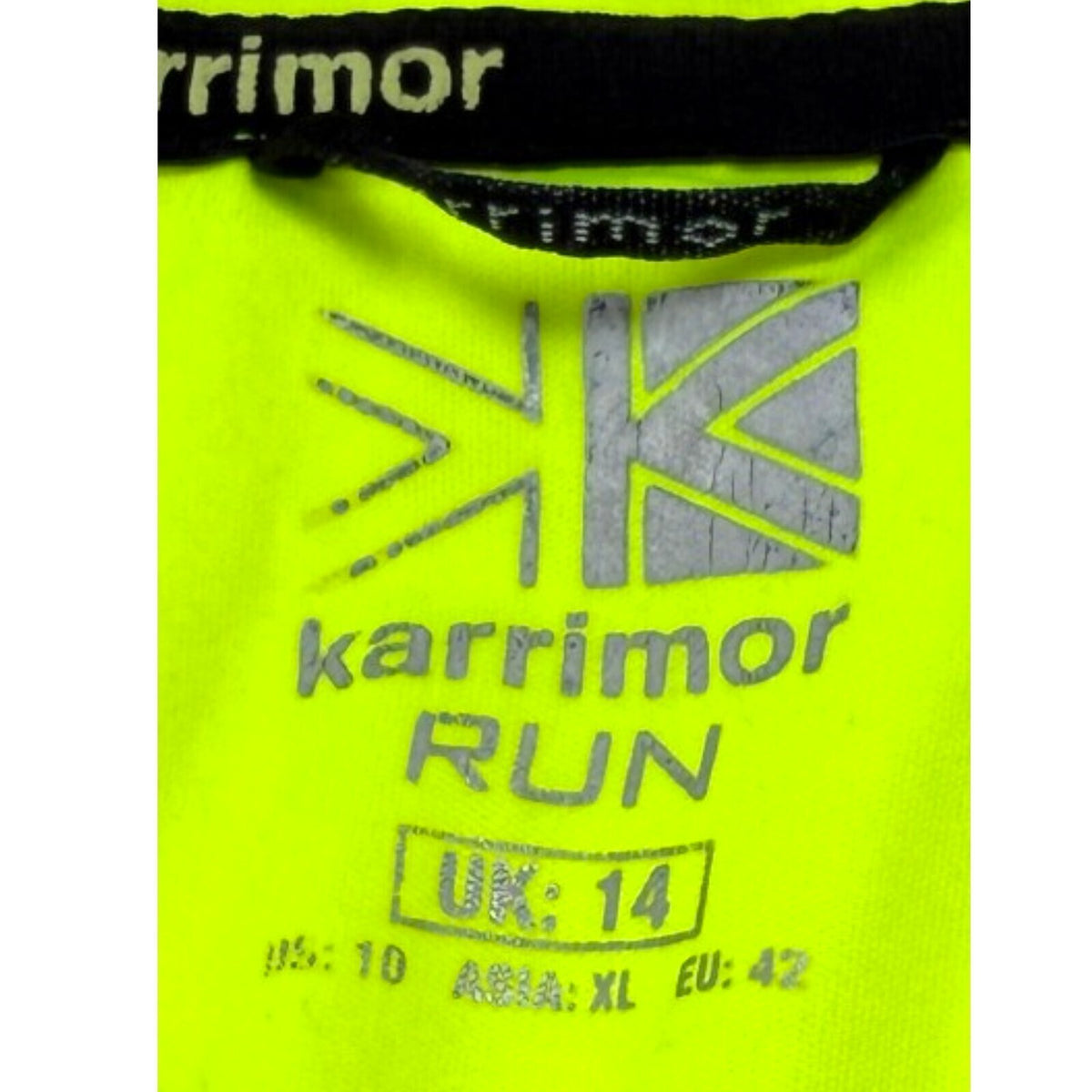 Karrimor yellow long sleeve run top with fluorescent accents and logo detail.