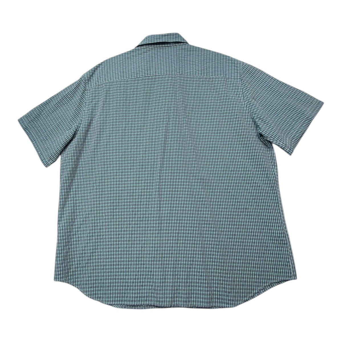 Marks & Spencer blue short sleeve shirt with pocket and subtle patterned design.