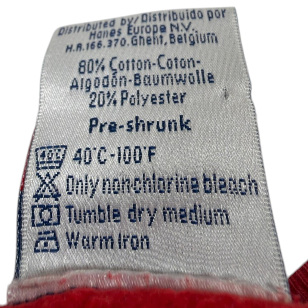 Hanes red crewneck jumper with long sleeves and elasticated cuffs.