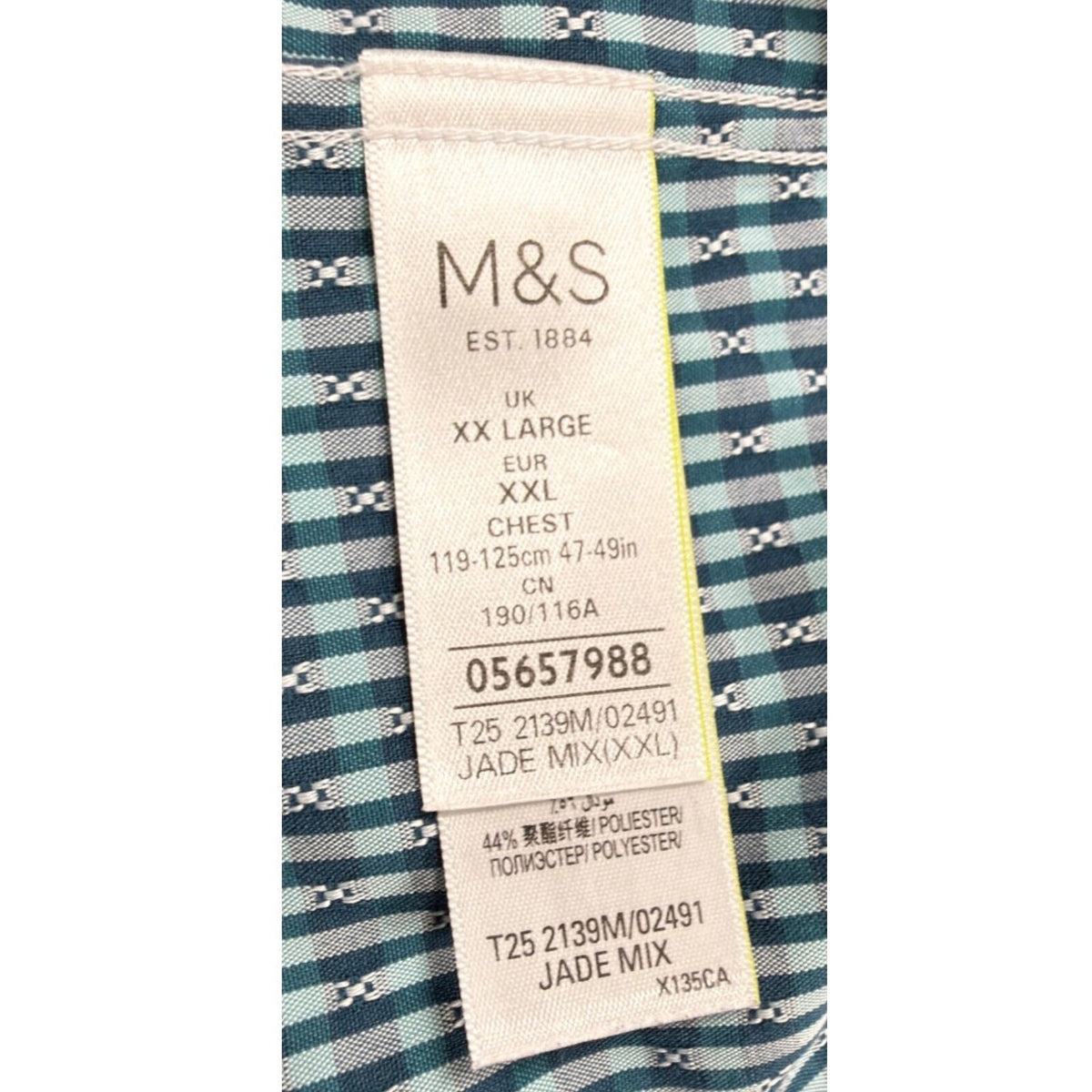 Marks & Spencer blue short sleeve shirt with pocket and subtle patterned design.