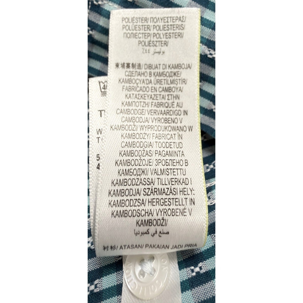 Marks & Spencer blue short sleeve shirt with pocket and subtle patterned design.
