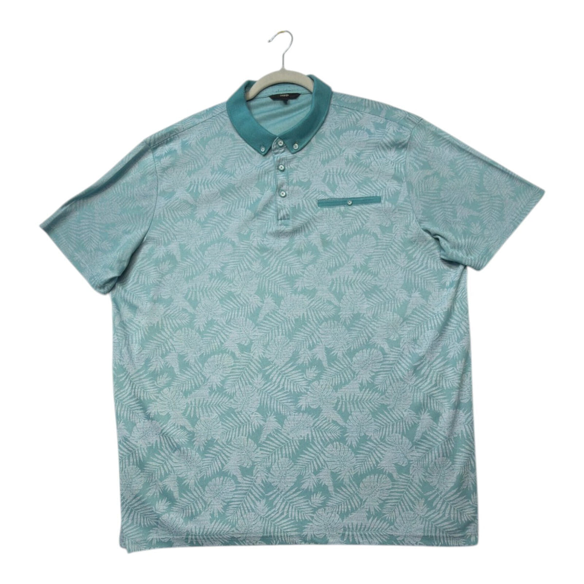 George green polo shirt with pocket, button-down, nature-inspired pattern.